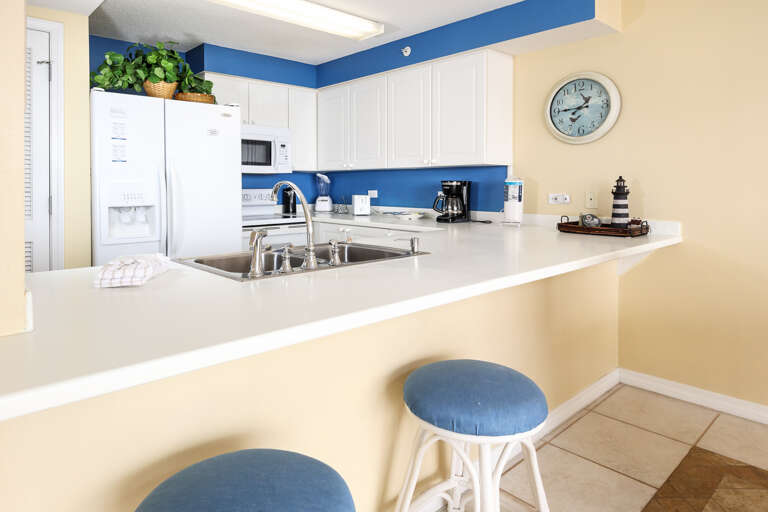 kitchen is fully stocked with all major appliances