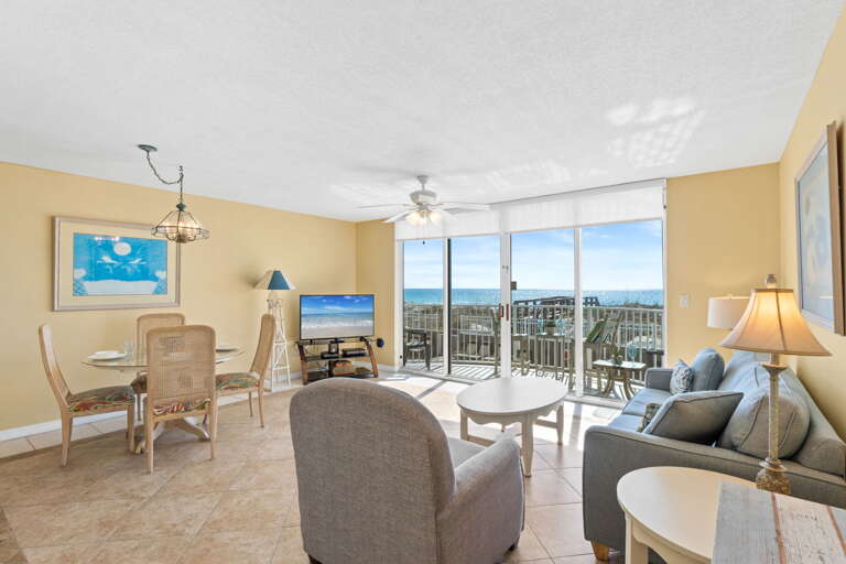 Living Area with the light filtering shades pulled down for privacy!