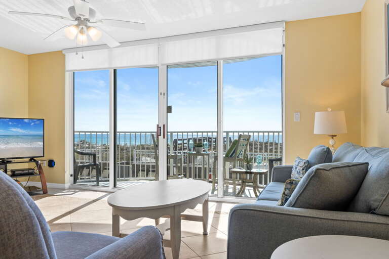 Come unwind in this beach front living area .. watch your favorite show or dolphin show..
