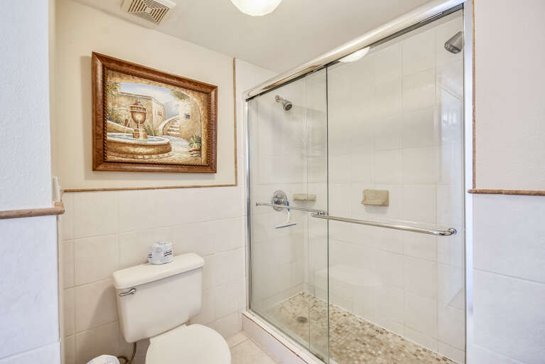 This master bathroom has a big walk in shower.  