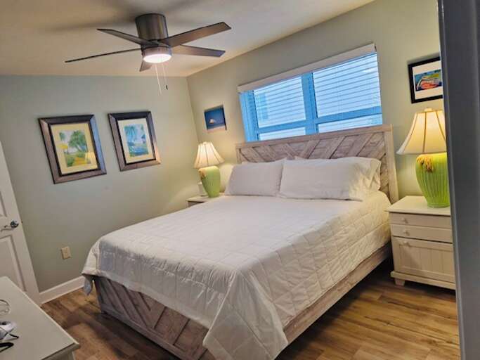 King sized bed, plenty of storage space, and a large window to let the sunshine in.