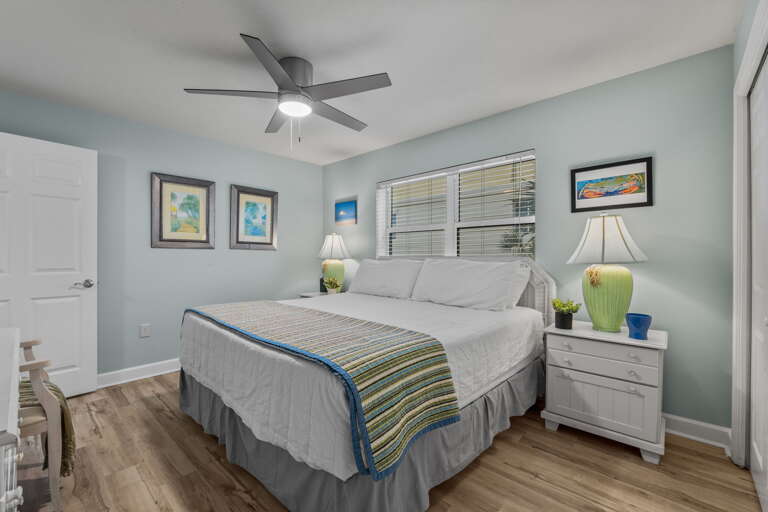 King sized bed, plenty of storage space, and a large window to let the sunshine in.