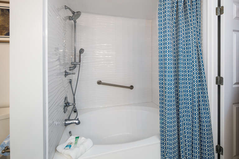 Tub/shower combo in the master bathroom.