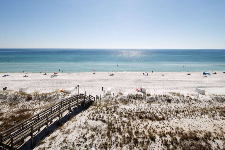 Just a short stroll across the private access to the beach. 