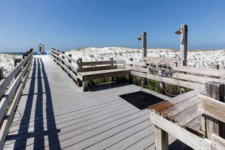 Sea Oats beach boardwalk with hoses and showers to rinse the sand off