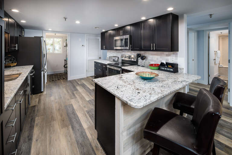Pretty counter tops and cabinets make cooking dreamy