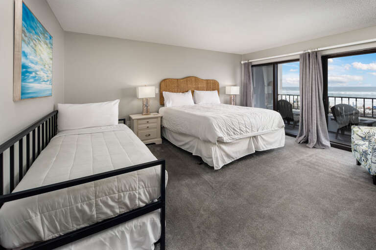 Featuring a king size bed and a day bed.