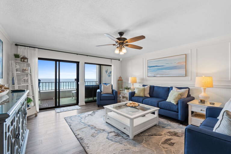 Plenty of seating in the living room with views of the beach!