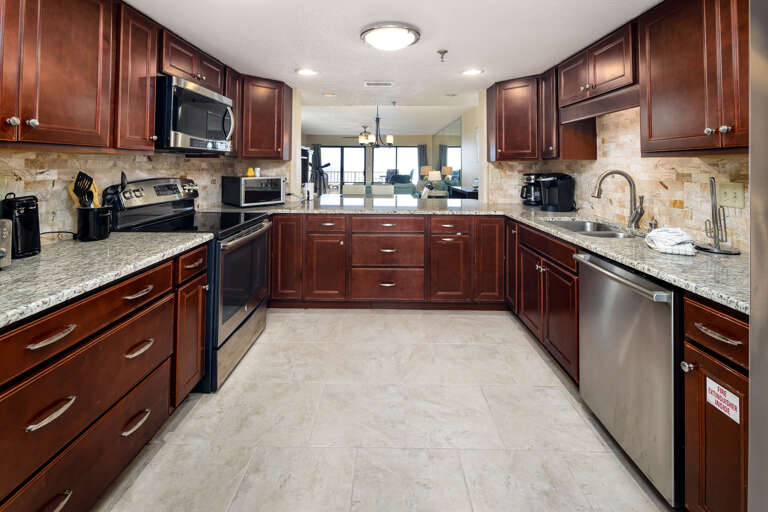 Classy appliances, granite counters, custom cabinets are awaiting the cook! The chef of the group will love this setup!