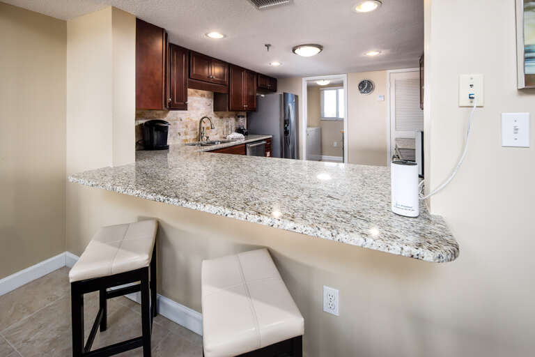 Additional seating at the breakfast bar for two.