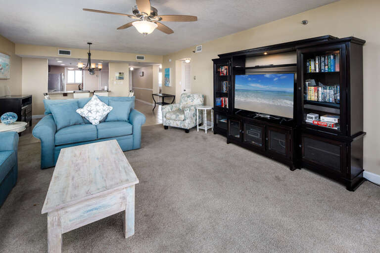 Fantastic entertainment center in the living area for everyone to enjoy during time in from the sunny beach.