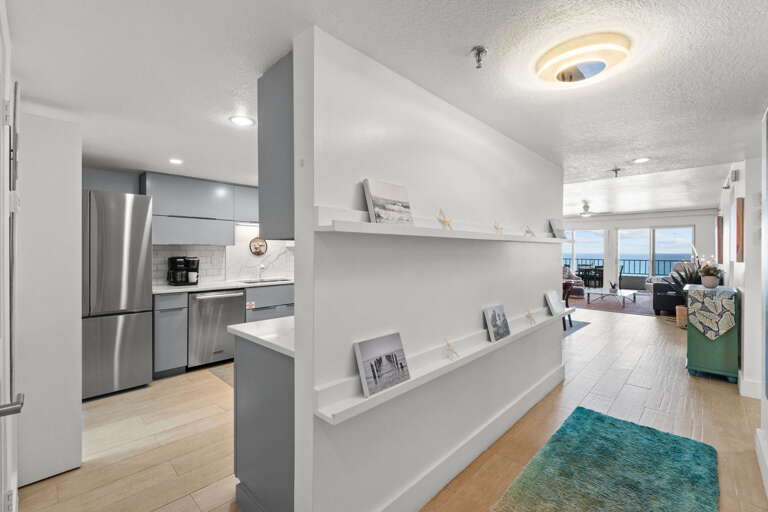 Kitchen is immediately to your left as you enter the condo.