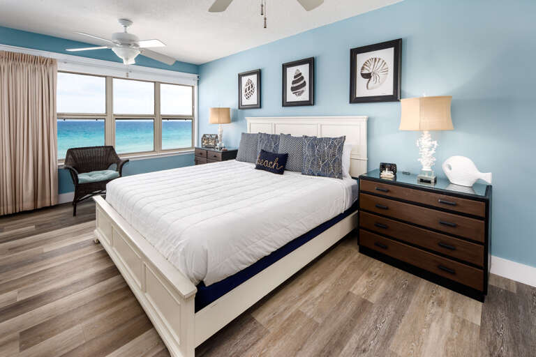 A king bed is featured in the master bedroom.