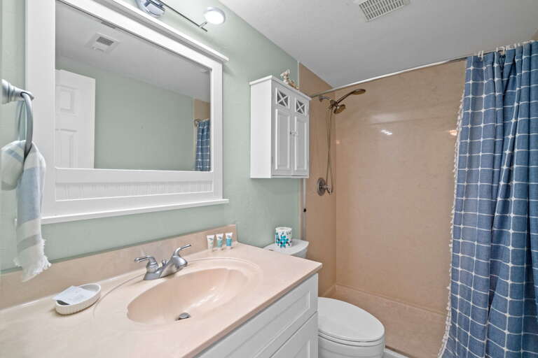 Featuring a walkin shower.