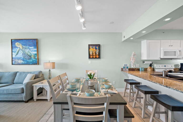 The dinning room table located next to the kitchen for your convenience