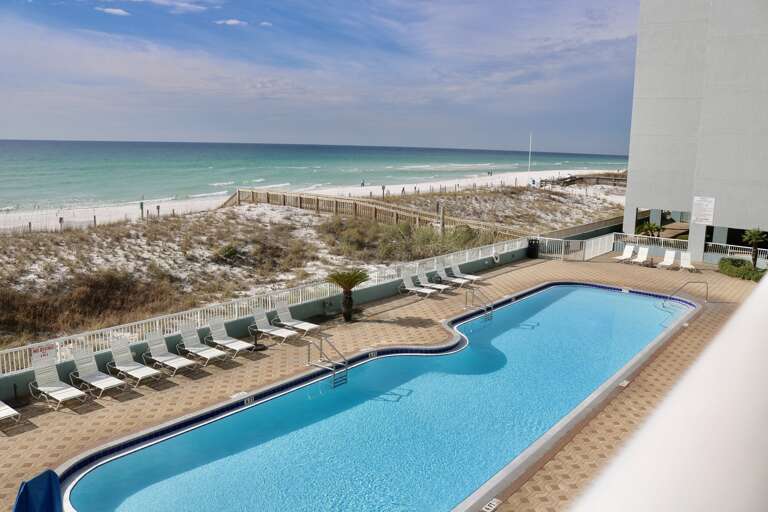 Plenty of lounge chairs in the pool area. You will sure find a spot for yourself  