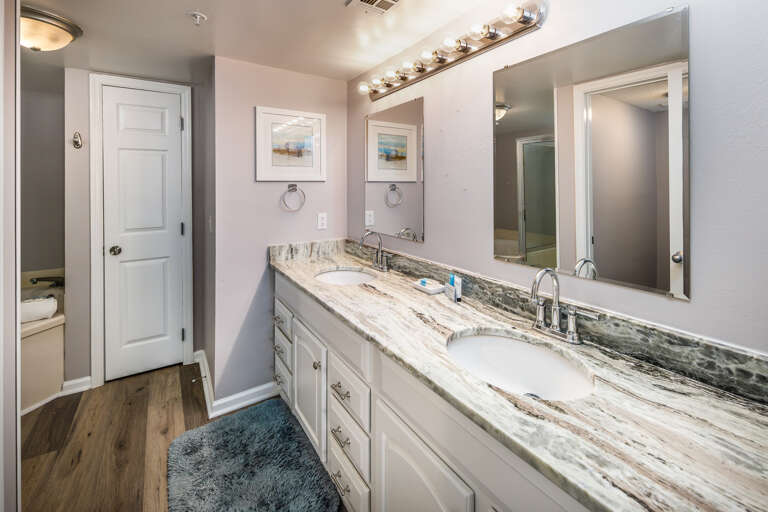 Super spacious bathroom with lots of sink & cabinet space. 