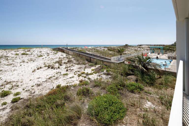 From the balcony you can see the private entrance to the beach.