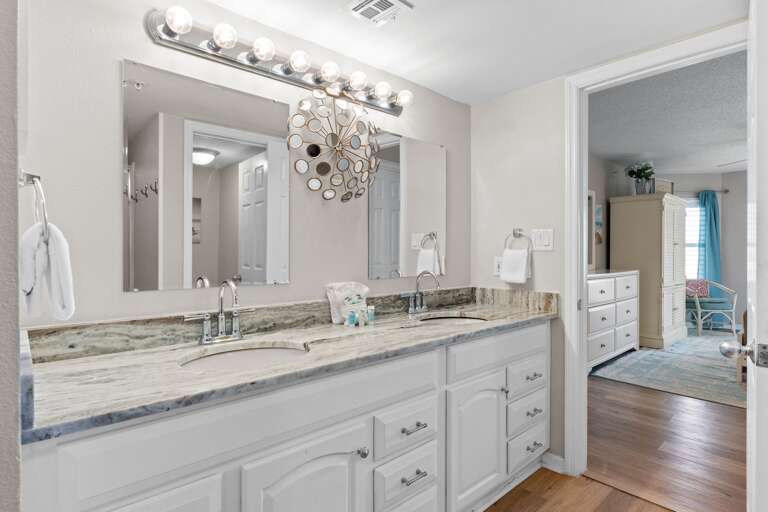 Super spacious bathroom with lots of sink & cabinet space. 