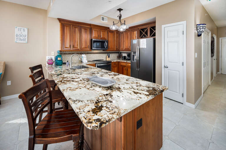Kitchen bar area provides a perfect location for a quick bite before heading to the beach.