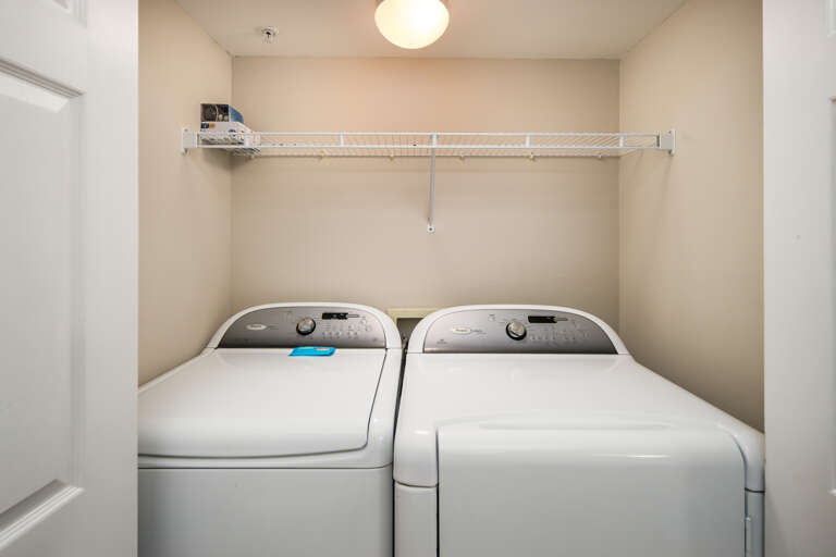 Washer and dryer in the condo for your laundry needs.
