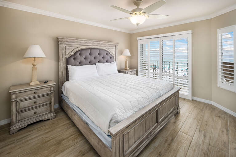 King size bed for a comfortable night's sleep and access to the private balcony