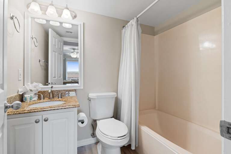 This is a private bath off of one of the guest rooms with a shower/tub combo