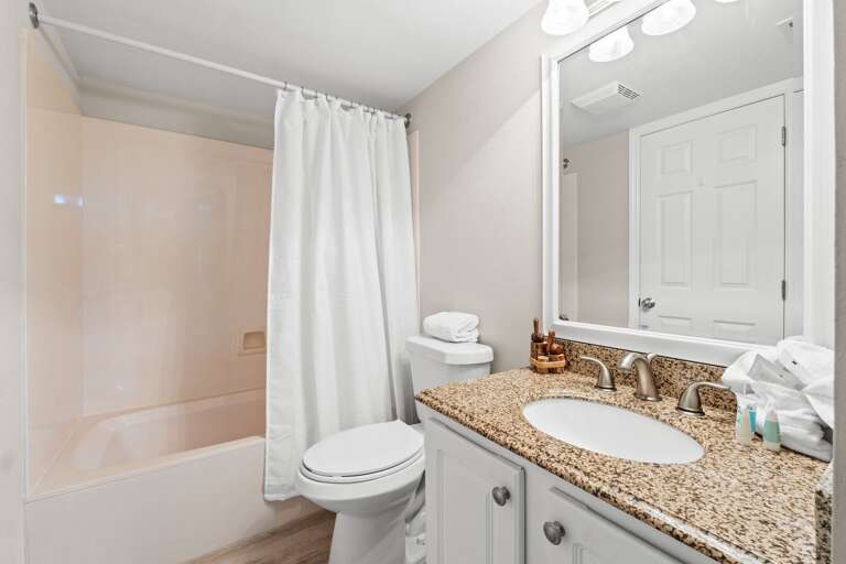This bath has entry from the hallway and the guest bedroom