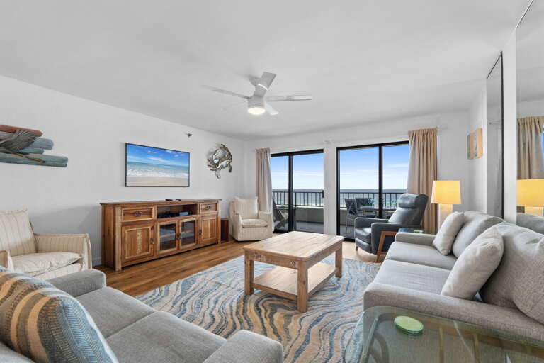 Living Room: Stunning ocean views await in this spacious retreat with stylish decor and plush seating!