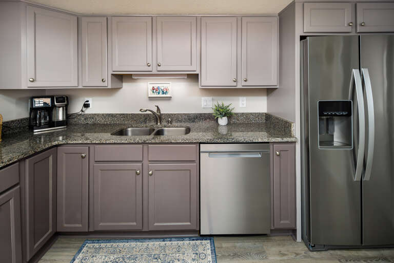 Stocked with stainless steel appliances. 