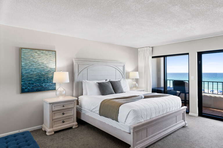 Ocean View Retreat: Enjoy stunning vistas from your private balcony in this elegant bedroom oasis!
