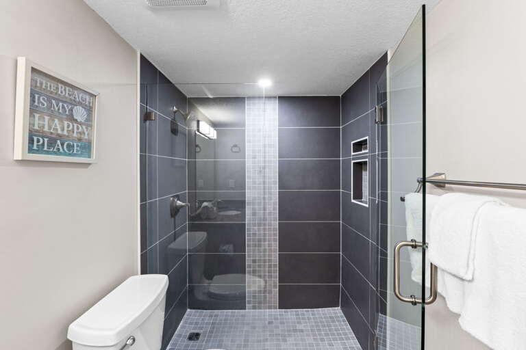Modern bathroom with walk-in shower.