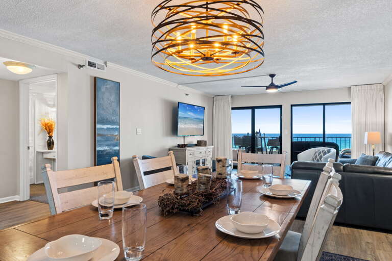 Gather around the elegant table and soak in stunning ocean views!