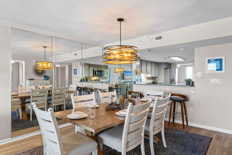 Dining for 6 with additional seating at the breakfast bar.