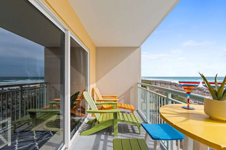 Bask in the sun on this private balcony overlooking the Gulf of Mexico