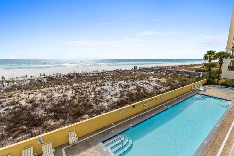 Beautiful resort pool with a view of the Gulf water!