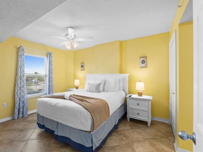 The 1st guest room has a queen bed and a private bathroom.