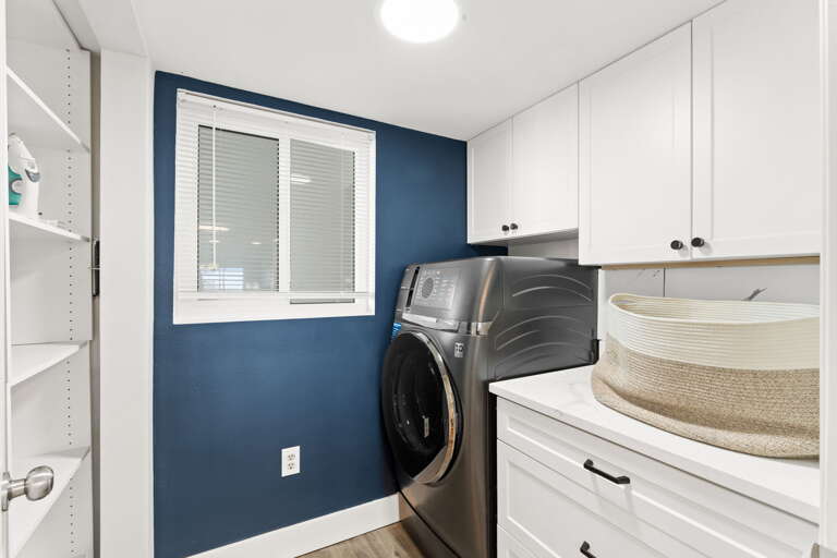 Full-sized washer and dryer for your convenience (starter pack of washing detergent now provided) 