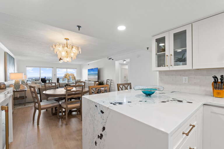 Dine comfortably at the table for five, thoughtfully nestled between the living room and kitchen with great views to enjoy.