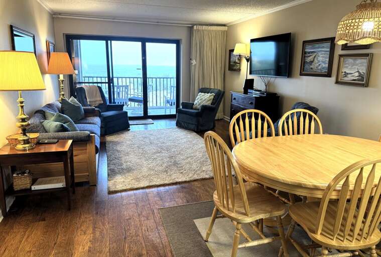 Lively Living Room Leading To Lovely Lakeside View