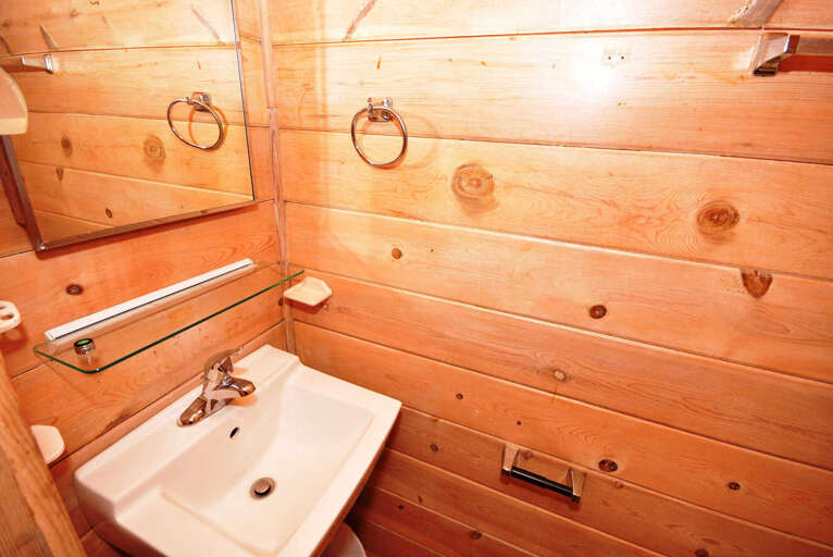 Half Bathroom off of Living Area