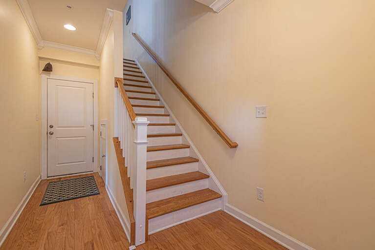 ENTRY-FOYER-AND GARAGE-DOOR-IN -PICTURE