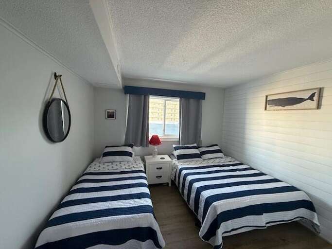 TIFFANIE BY THE SEA 118D