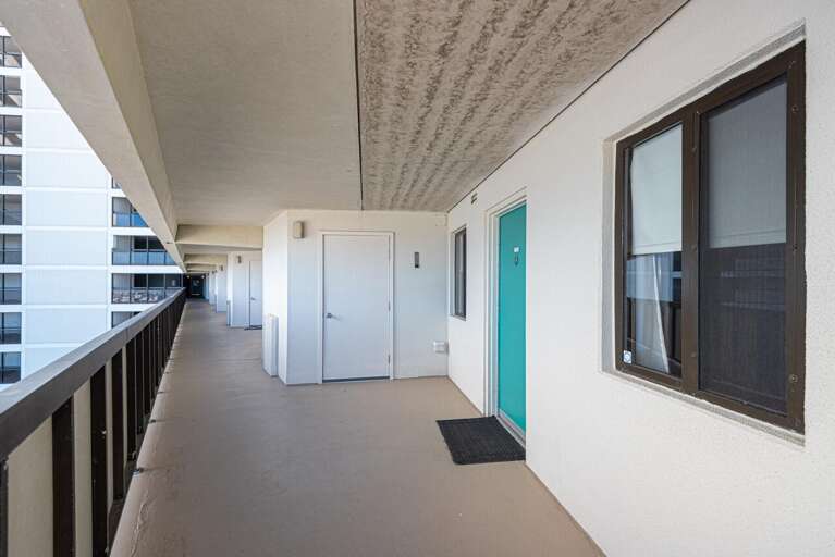 REAR-WALKWAY-OF-SHED-WITH-WASHER-DRYER