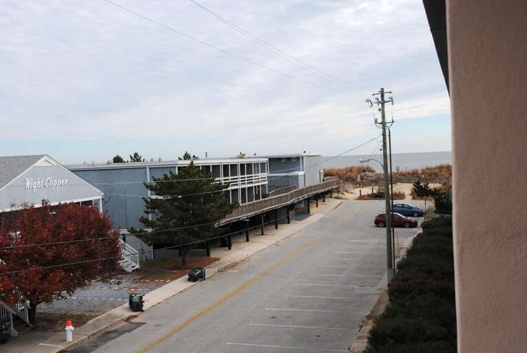 Ocean Terrace 313 balcony view with a glimpse of Ocean City's Beach