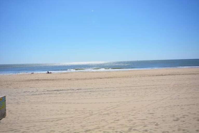 Beach In Front of Ocean Beach Building