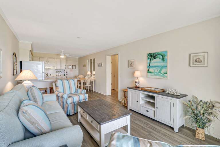 Nice open floor plan with new flooring, paint and furniture.  Plus a queen sized sleeper sofa!