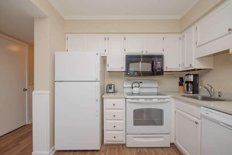 Lovely bright white kitchen with all the appliances needed to make your vacation a breeze. 