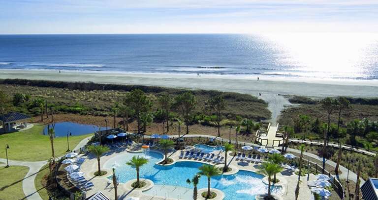 view of Hilton Ocean Oaks resort pool - guests have access to their amenities. view of Hilton Ocean Oaks resort pool - guests have access to their amenities.