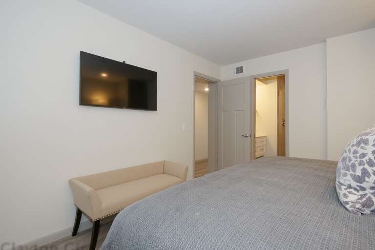 Master bedroom offers upgraded furniture , very comfy king size bed, closet space ,flat screen T.V and private master bathroom .